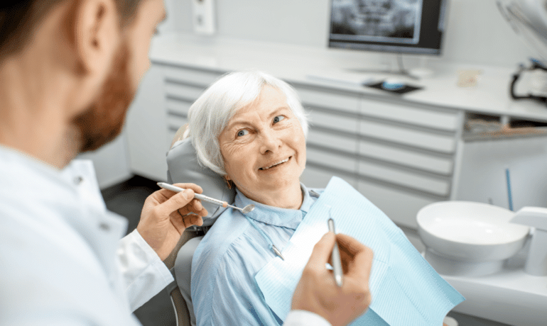 Old woman having a dental check up