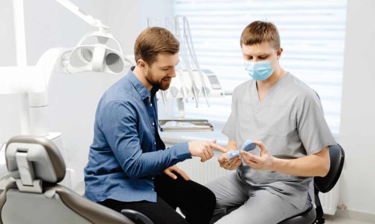 patient getting instructions on dental implant safety